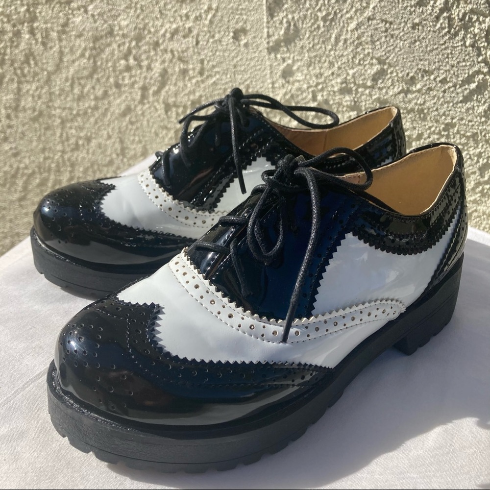 Faux patent leather heeled black and white oxfords